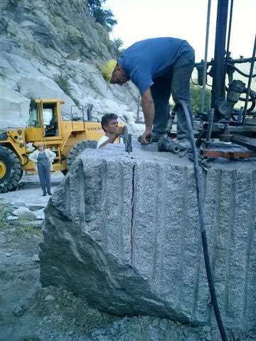 Pneumatic hammer splitter, split granite work site